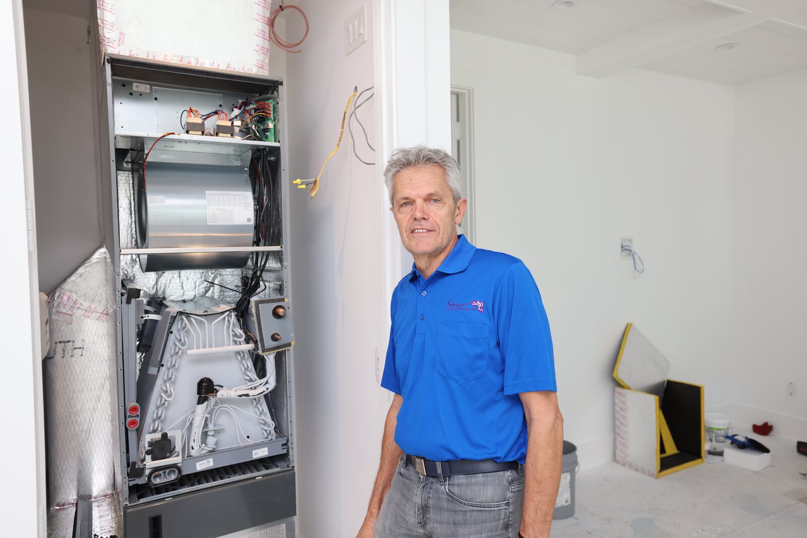 Open air handler inspection before the panels go back on